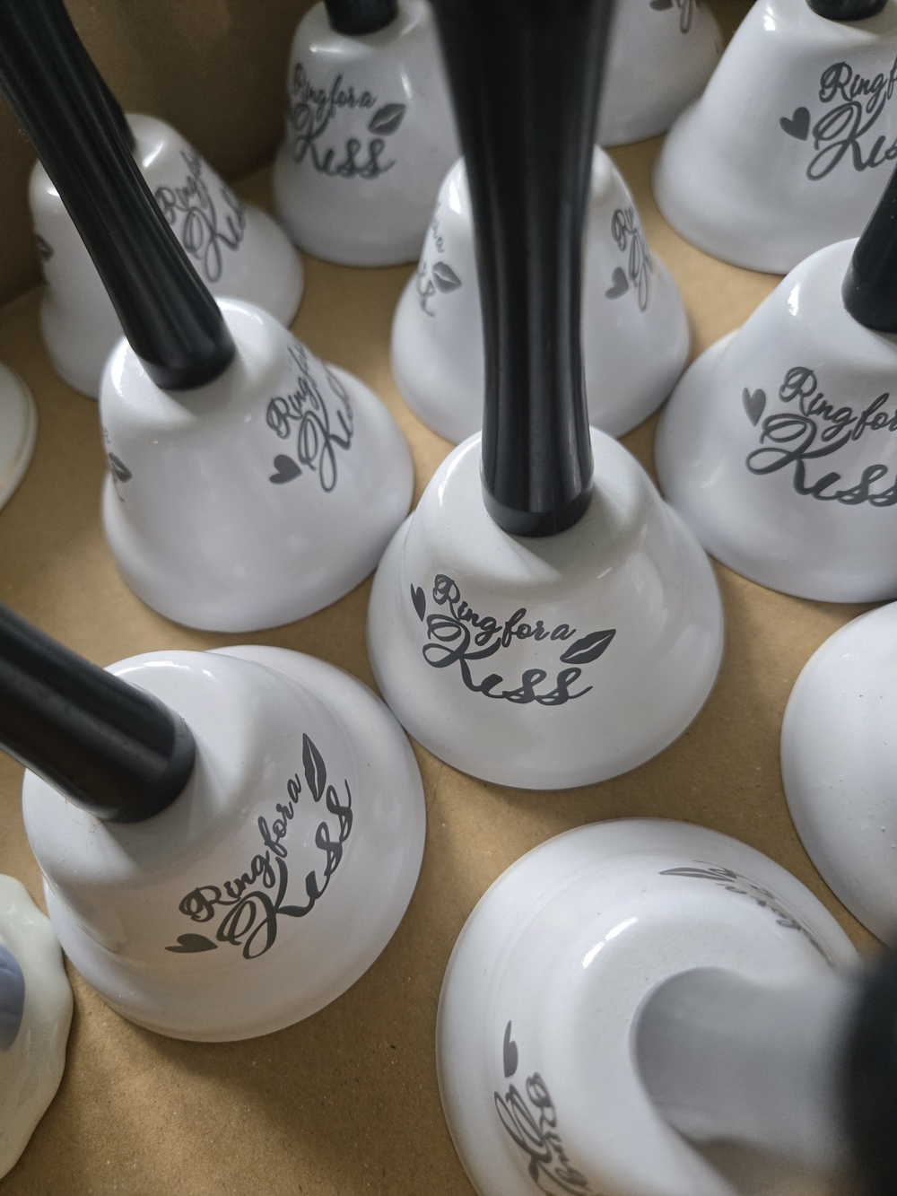 Ring For a Kiss White Metal Hand Bells with Black Handles (Set)